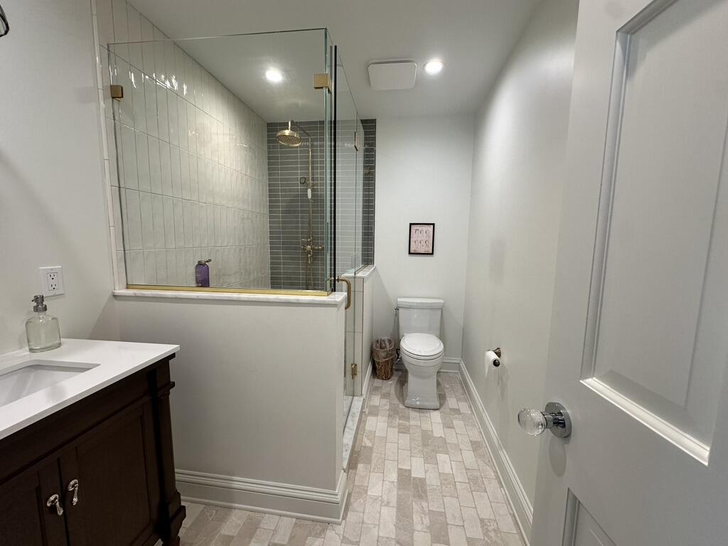 Walk-In Shower Remodel — Mosaic Floor & Gold Fixtures — completed by FirstLine Build Group in Poughquag, NY